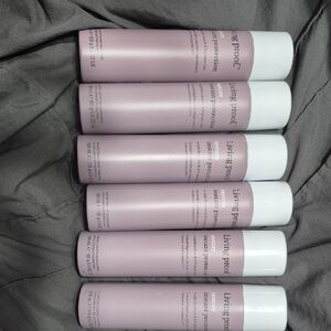 Living Proof Restore Instant Protection Spray - Pale Mauve and White Bottles